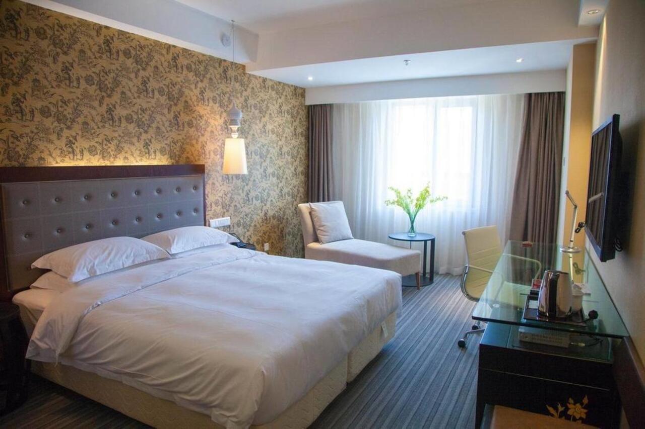 Traveler Inn-Hepingli Пекин Экстерьер фото