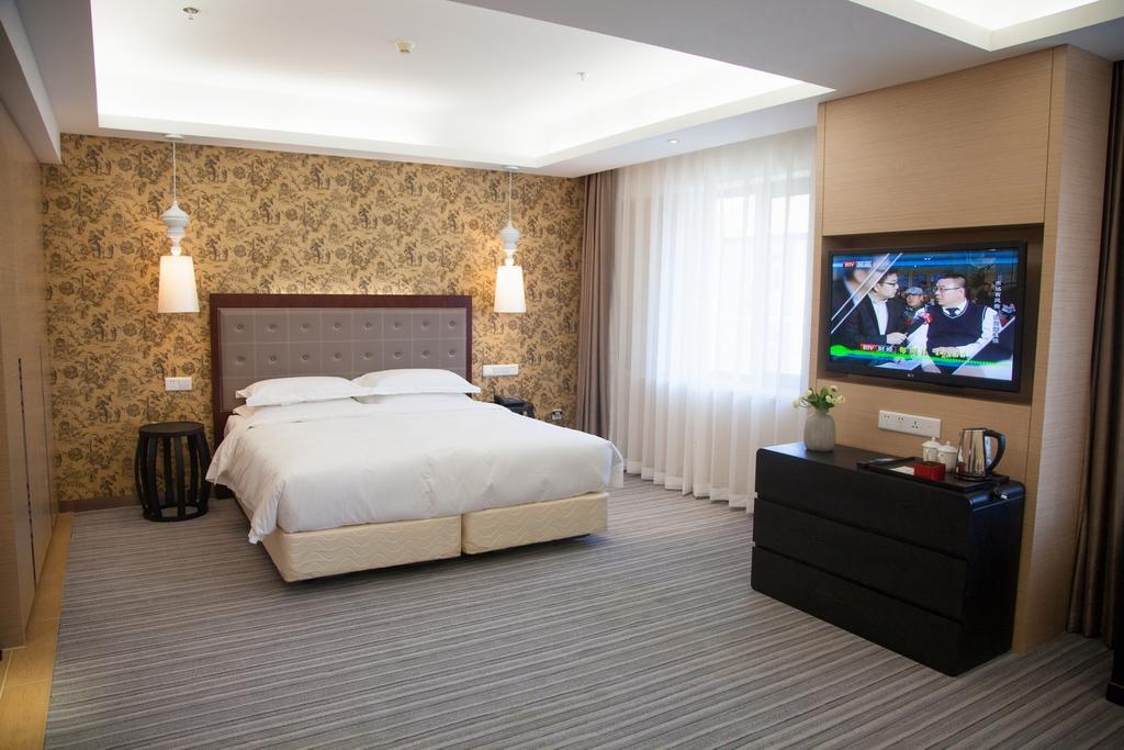 Traveler Inn-Hepingli Пекин Номер фото