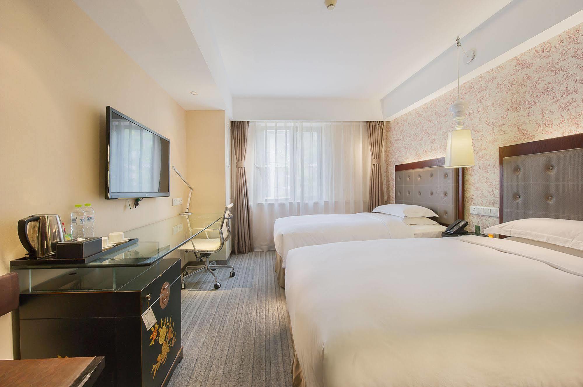 Traveler Inn-Hepingli Пекин Экстерьер фото
